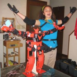 girl pilots fighting robot